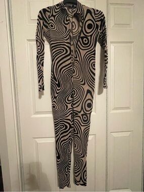 FashionNova Beige & Black Swirl-Print Long-Sleeve Jumpsuit